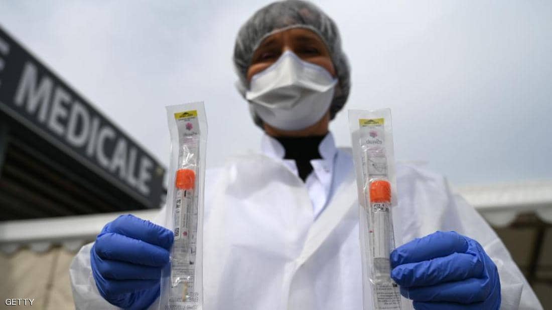 Laboratory worker reveals rapid inspection apparatus