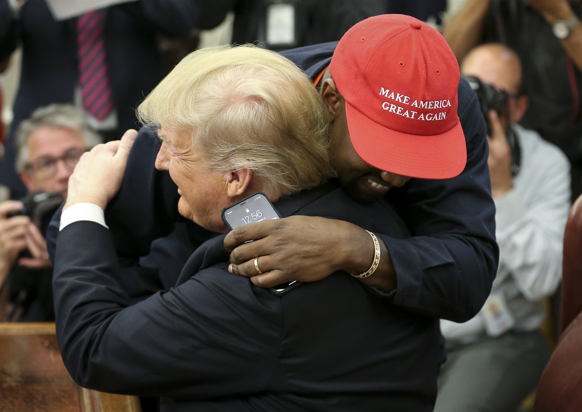President Donald Trump hugs Kanye West during a meeting at the White House in 2018.Pool - Getty Images