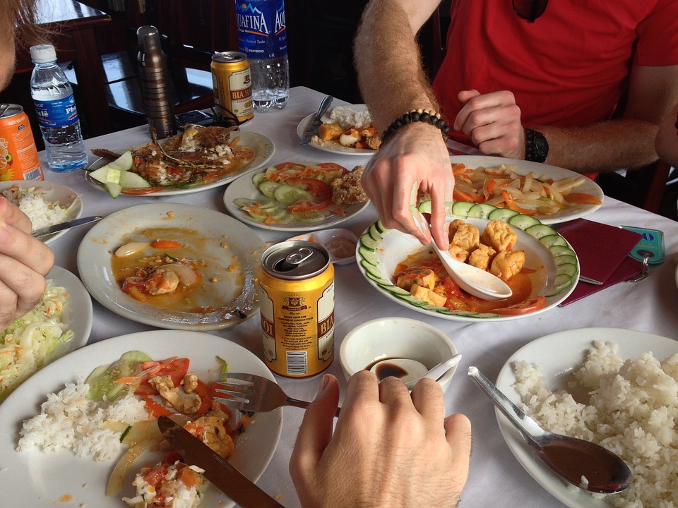 Start eating before the waiter introduces food to everyone at the table